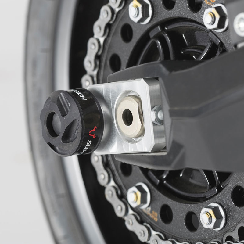 Tope protector de eje trasero para motocicleta